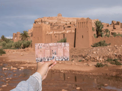 Photo of a Game of Thrones scene held up near the filming location at Aït Benhaddou, Morocco