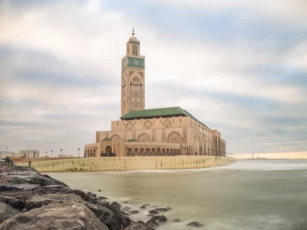 Hassan II Mosque in Casablanca with oceanfront view at sunset