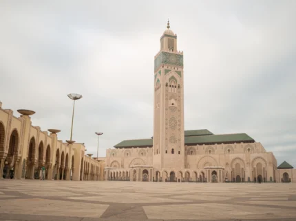 The Hassan II Mosque in Casablanca, Morocco, with its towering minaret and oceanfront location.