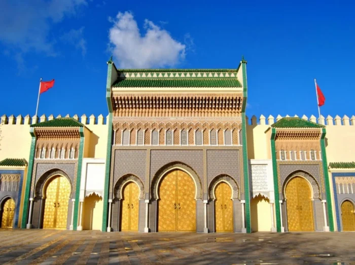 Ornate golden doors of the Royal Palace (Dar al-Makhzen) in Fez, Morocco
